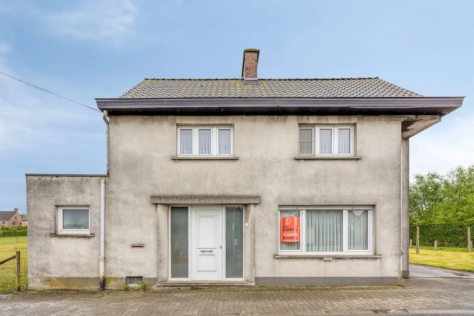 Hoofdfoto van de publicatie: Woning met tuin te Asper.