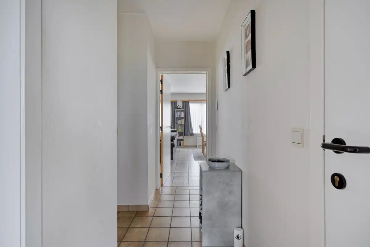 Opbrengsteigendom met 3 appartementen en 7 garages foto 21