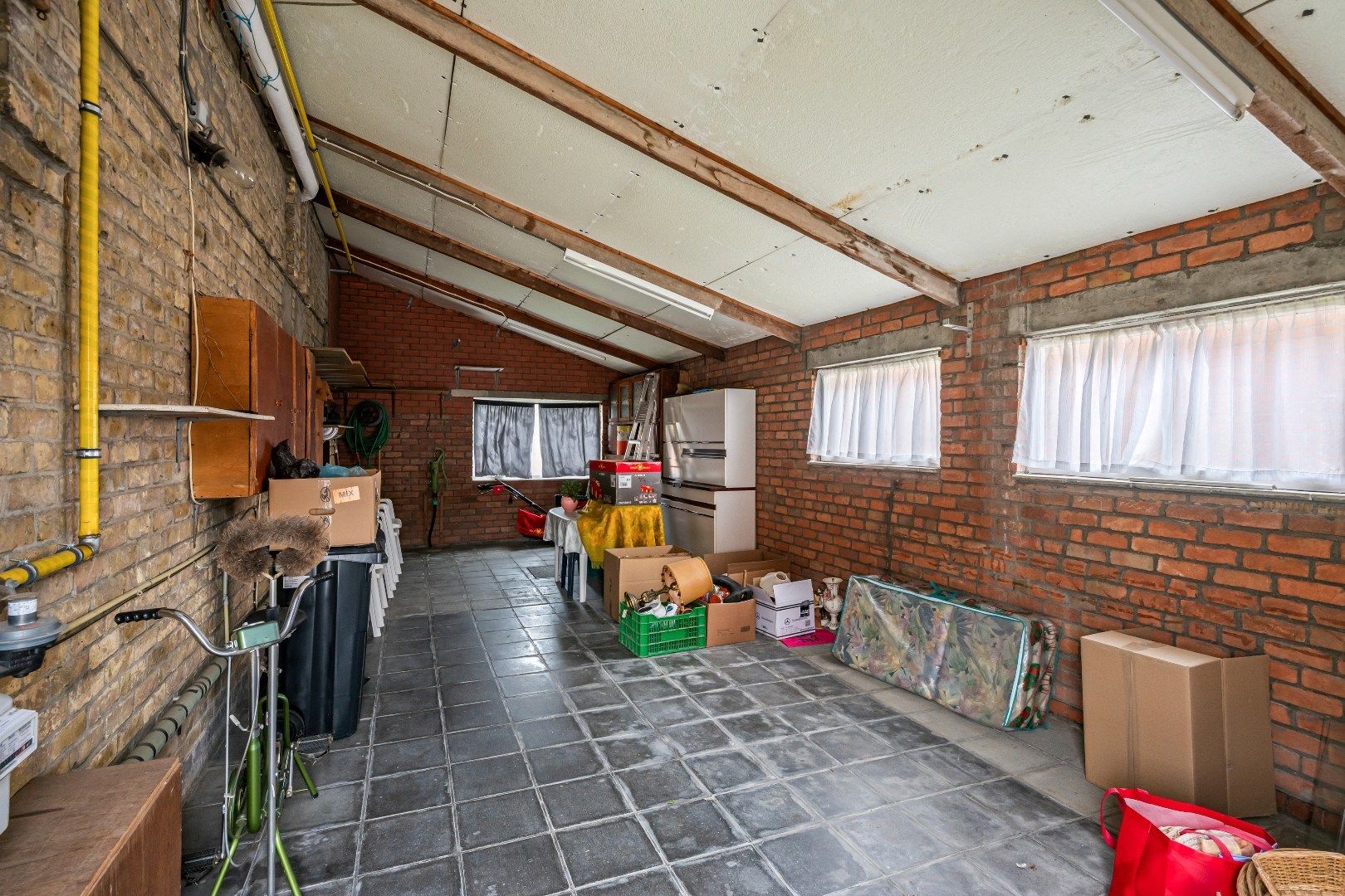 Op te frissen woning met 3 slaapkamers, garage en tuin. foto 19