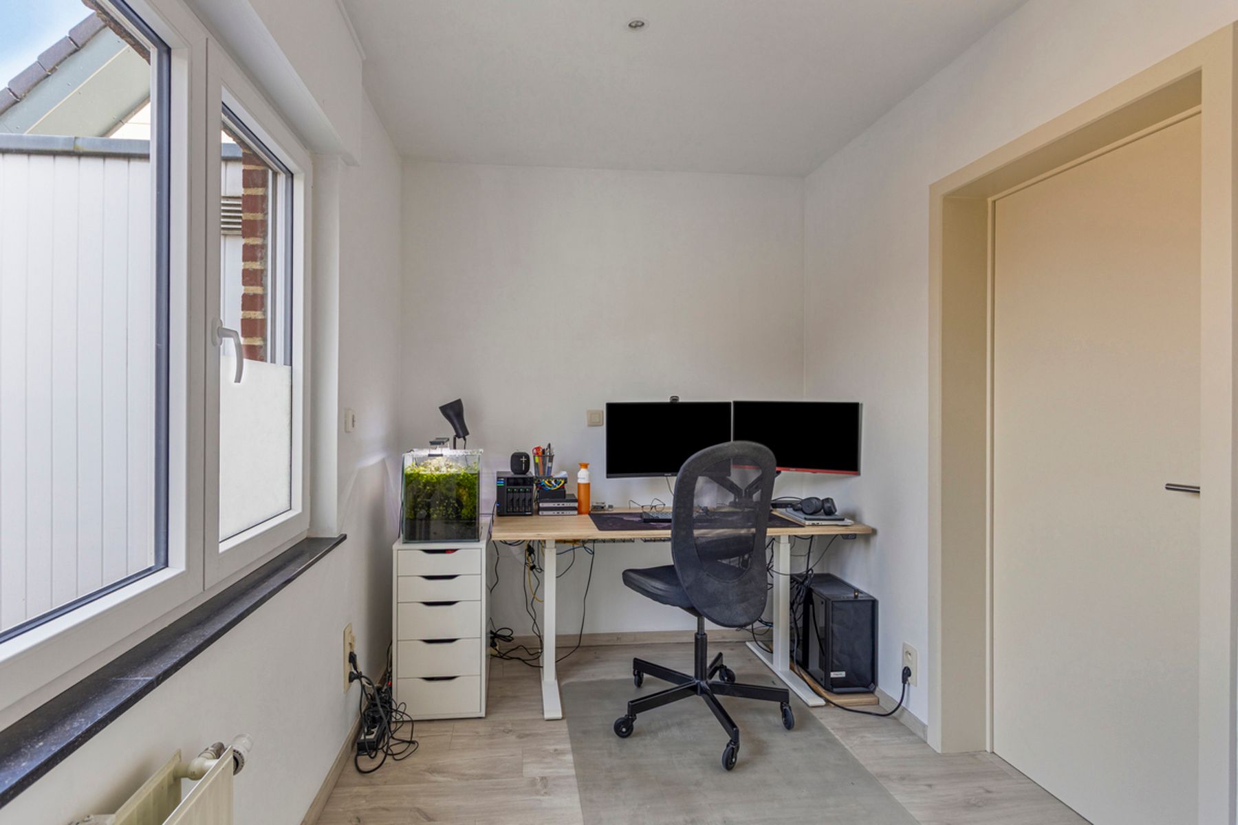 Opbrengsteigendom 2 appartementen en 2 commerciële ruimtes foto 25