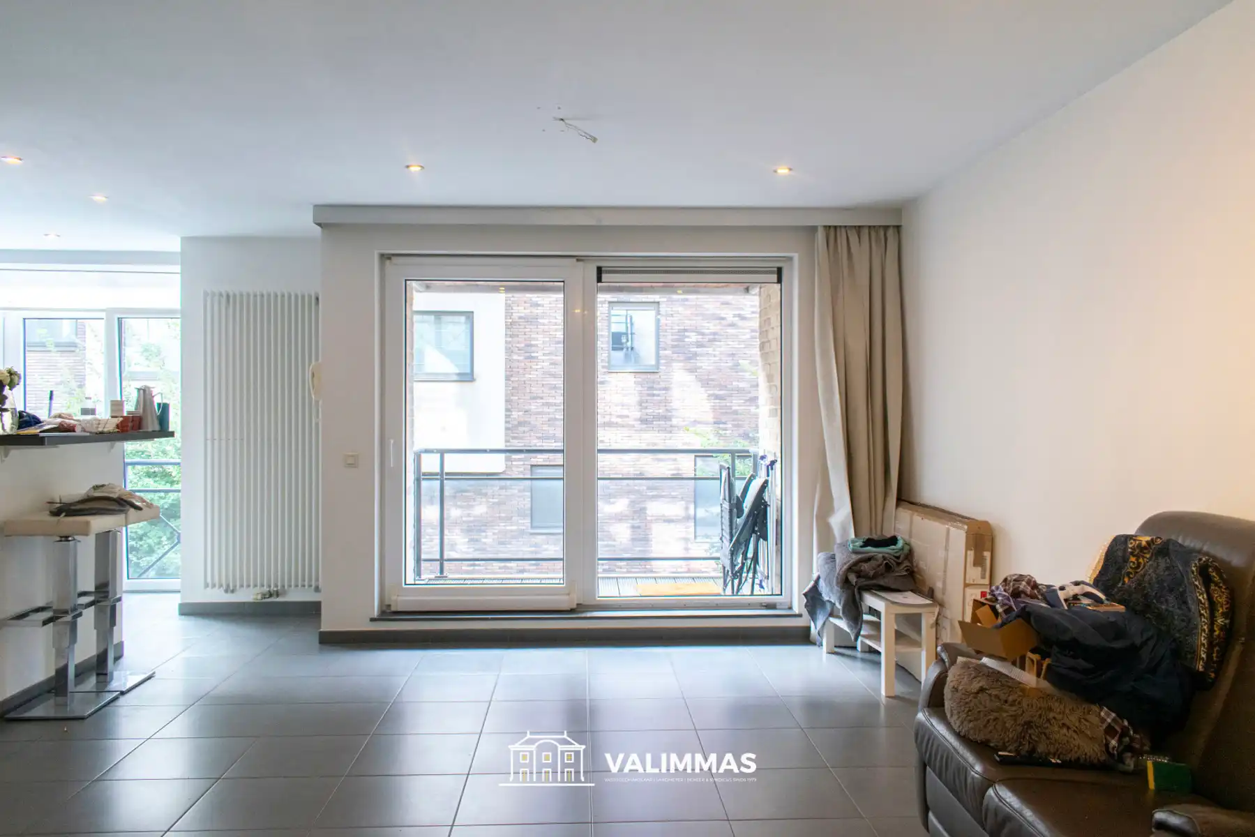 Verzorgd, energiezuinig appartement met 2 terrassen & kelder foto 3