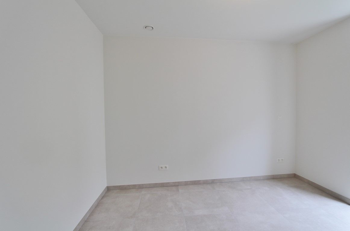 Nieuwbouw éénslaapkamerappartement in het centrum van Sint-Truiden! foto 16