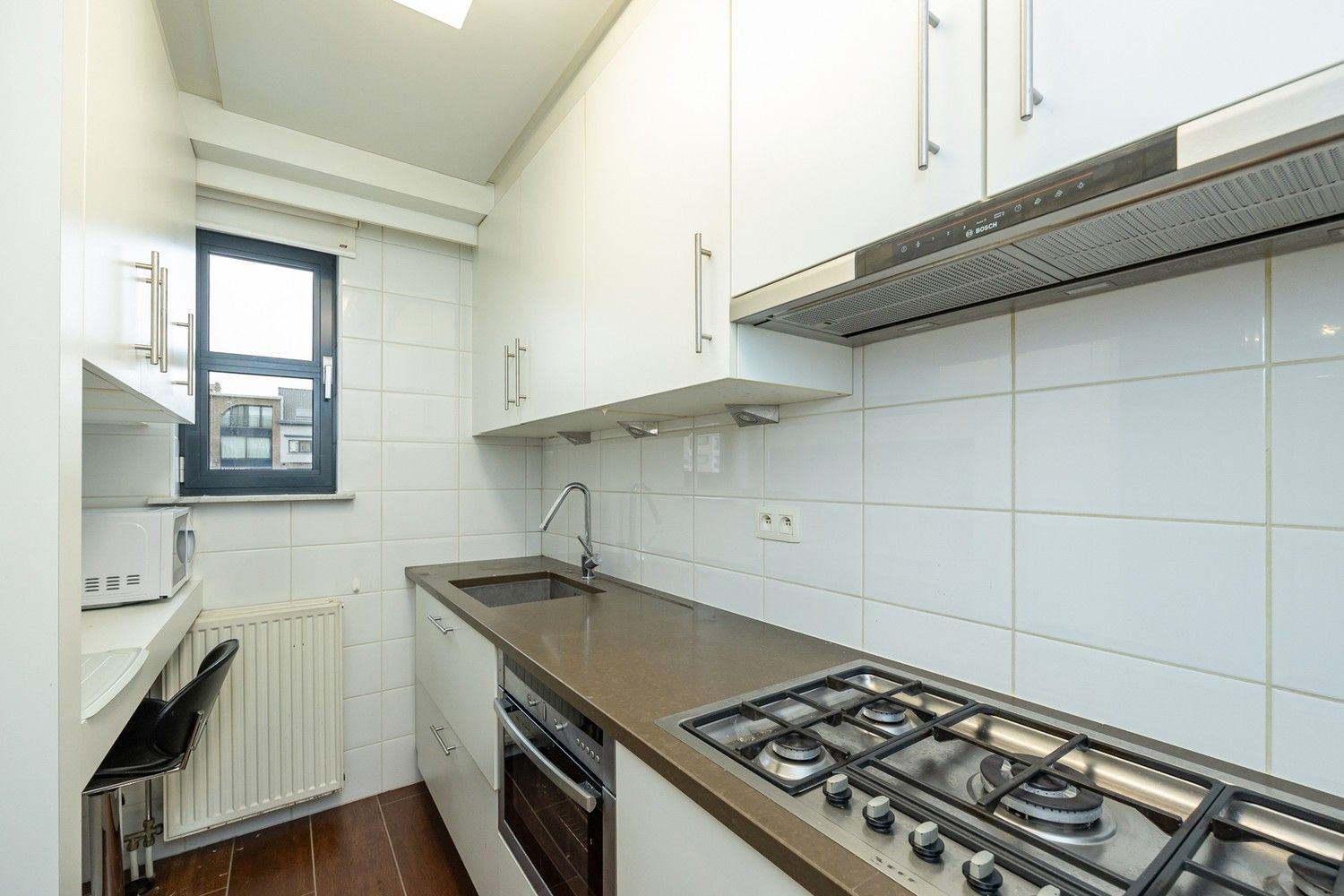 Gelijkvloers appartement (91 m²) met 2 slpk, tuin (85 m²) en ondergrondse autostaanplaats incl.! foto 7