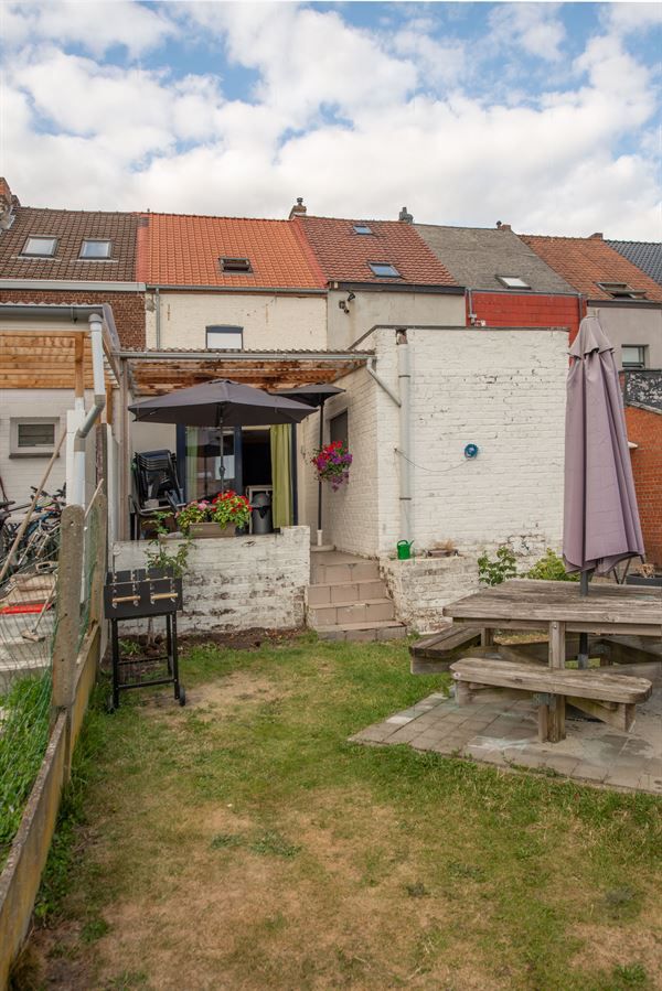 Een ruime, instapklare rijwoning met tuin en een bewoonbare oppervlakte van 174m², gelegen op wandelafstand van het centrum foto 10