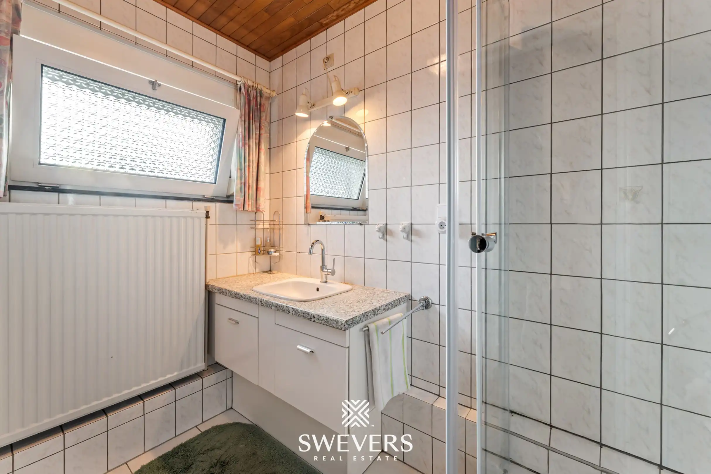 Instapklare gelijkvloerse woning met 4 slaapkamers op rustige en centrale ligging in Houthalen foto 24