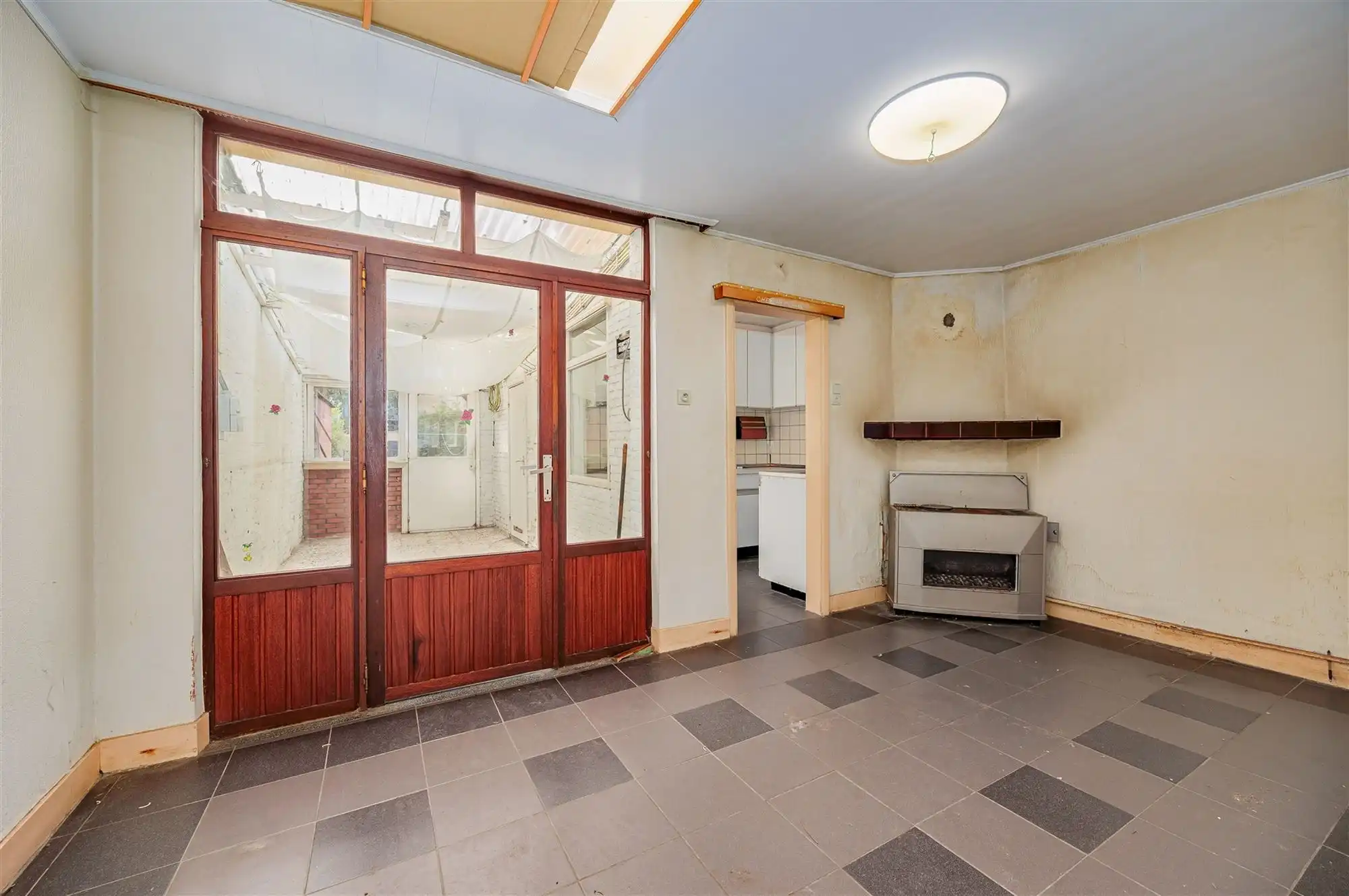 Te renoveren woning met 3-4  slk met gezellige tuin foto 5