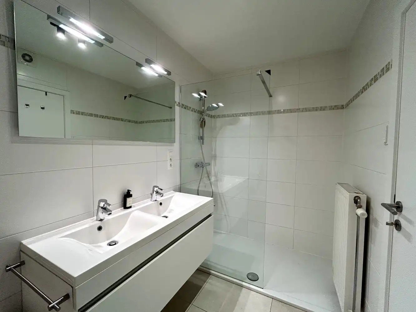 Instapklaar gelijkvloers appartement met privatieve tuin en garage in hartje Kessel-Lo foto 11