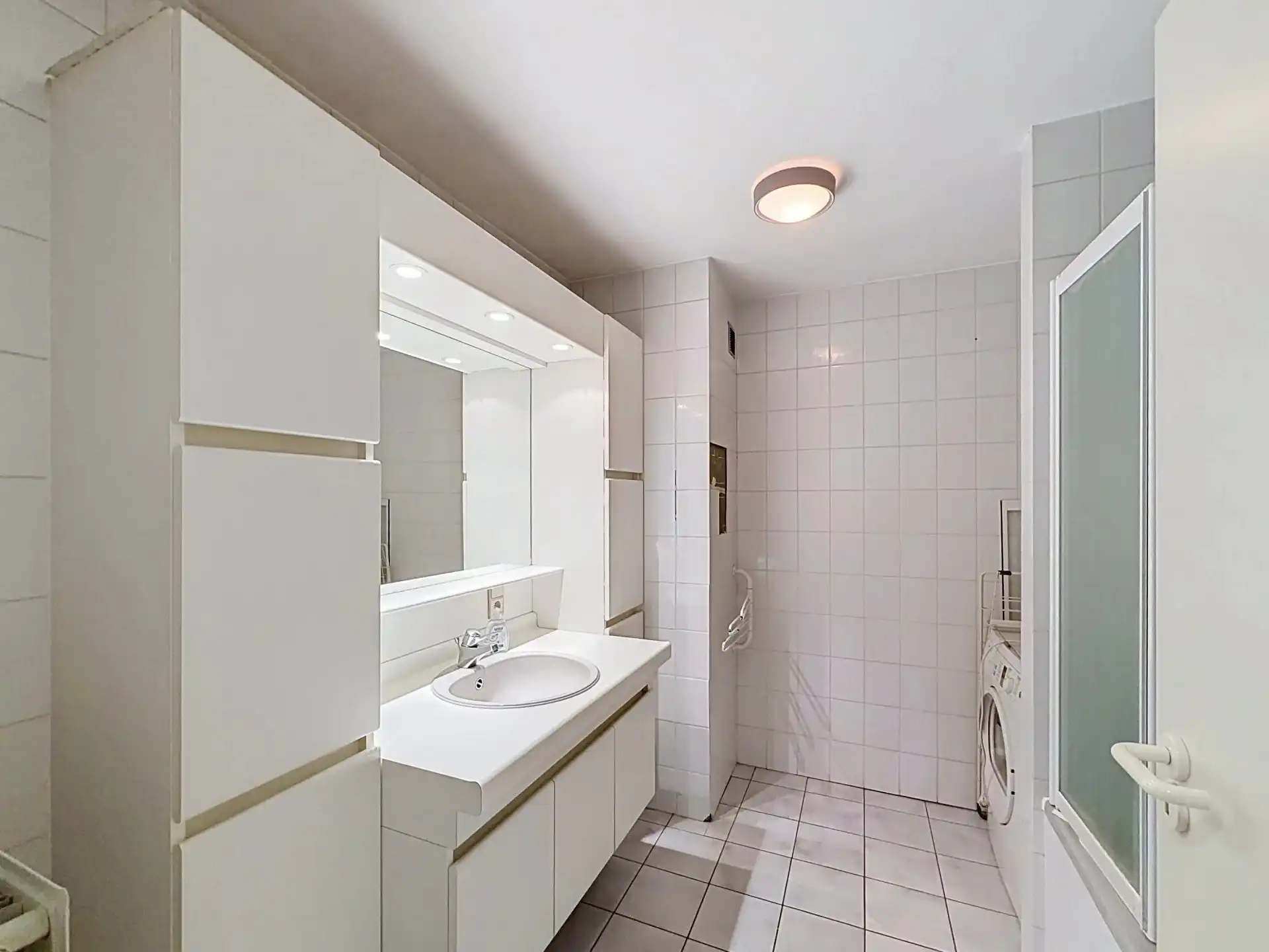 Ruim appartement met 2 slaapkamers, 2 staanplaatsen en 3 kelders foto 19