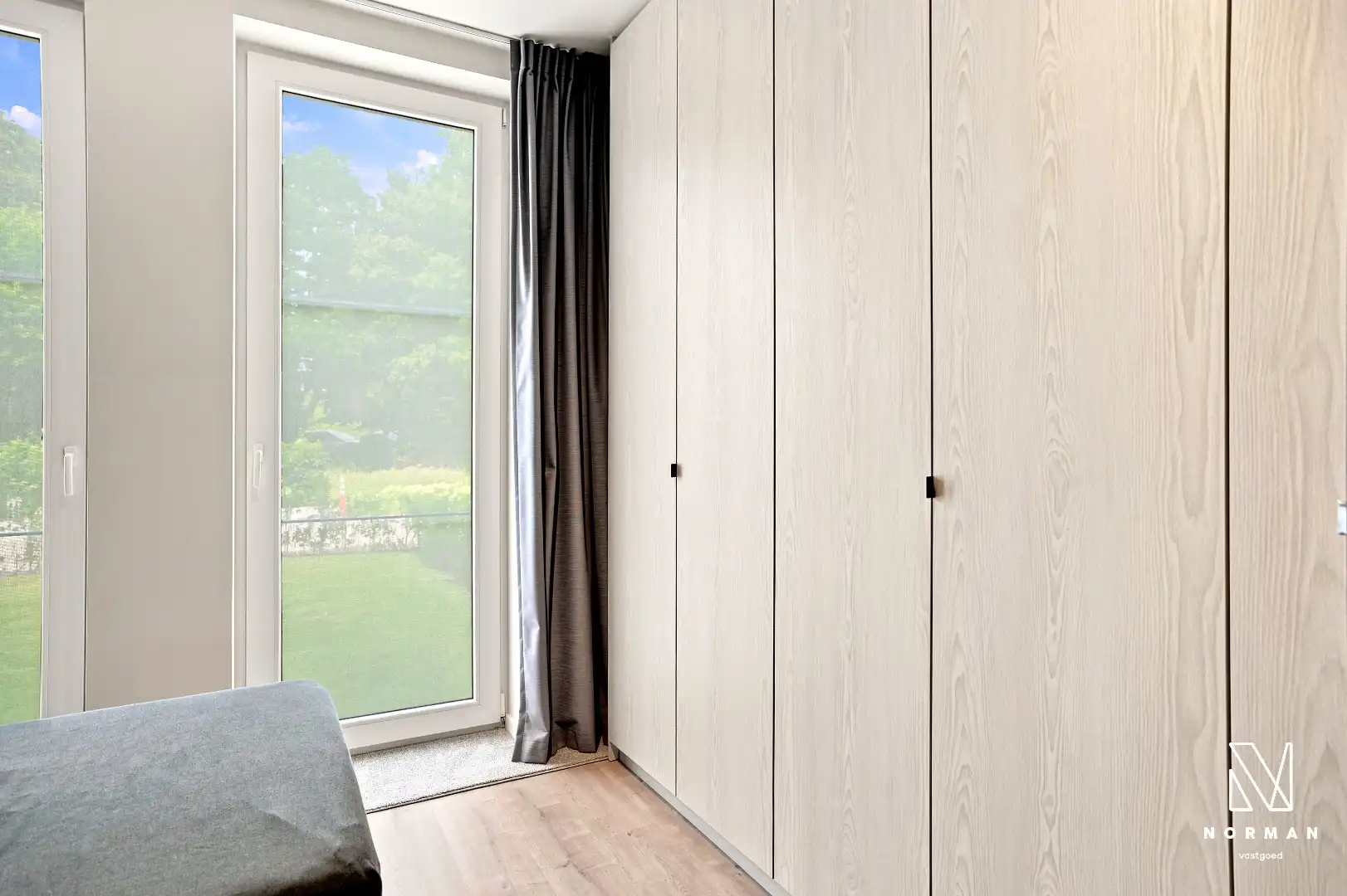 Instapklaar recent gelijkvloers appartement met 1 slaapkamer, tuin en ondergrondse staanplaats te koop in Harelbeke foto 11