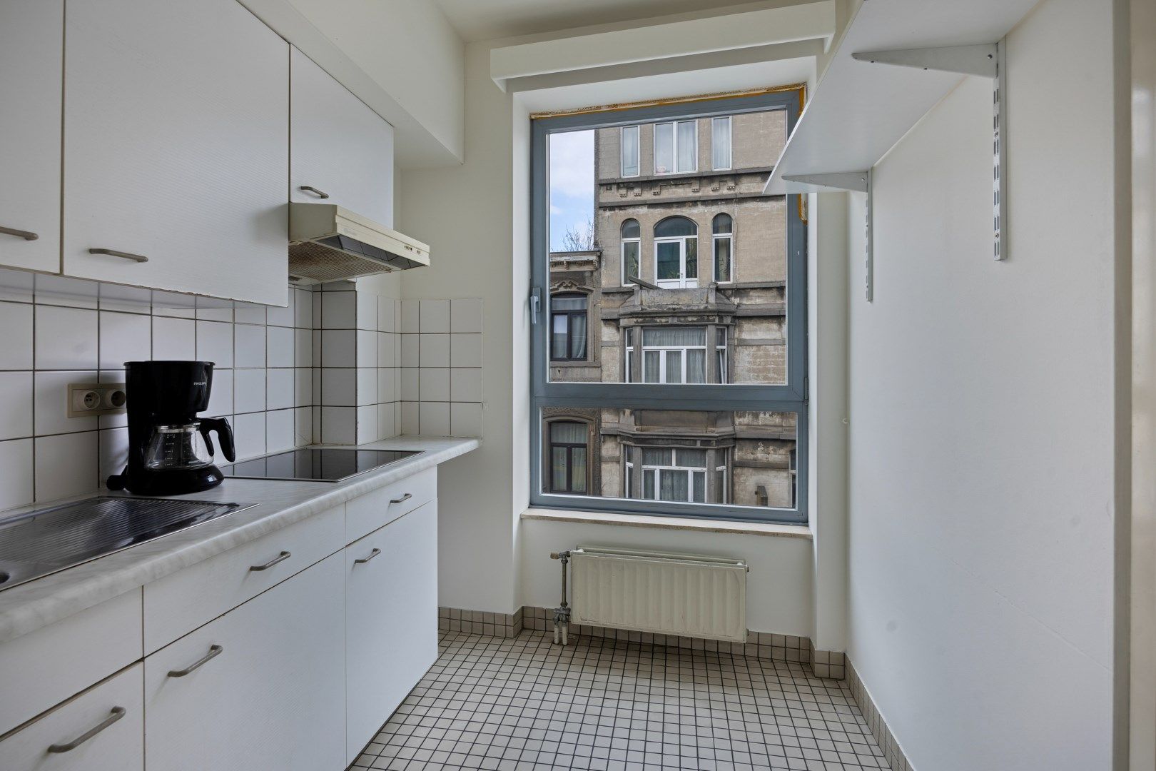 Op te frissen 1-slaapkamer-appartement in het bruisende Schaarbeek foto 10