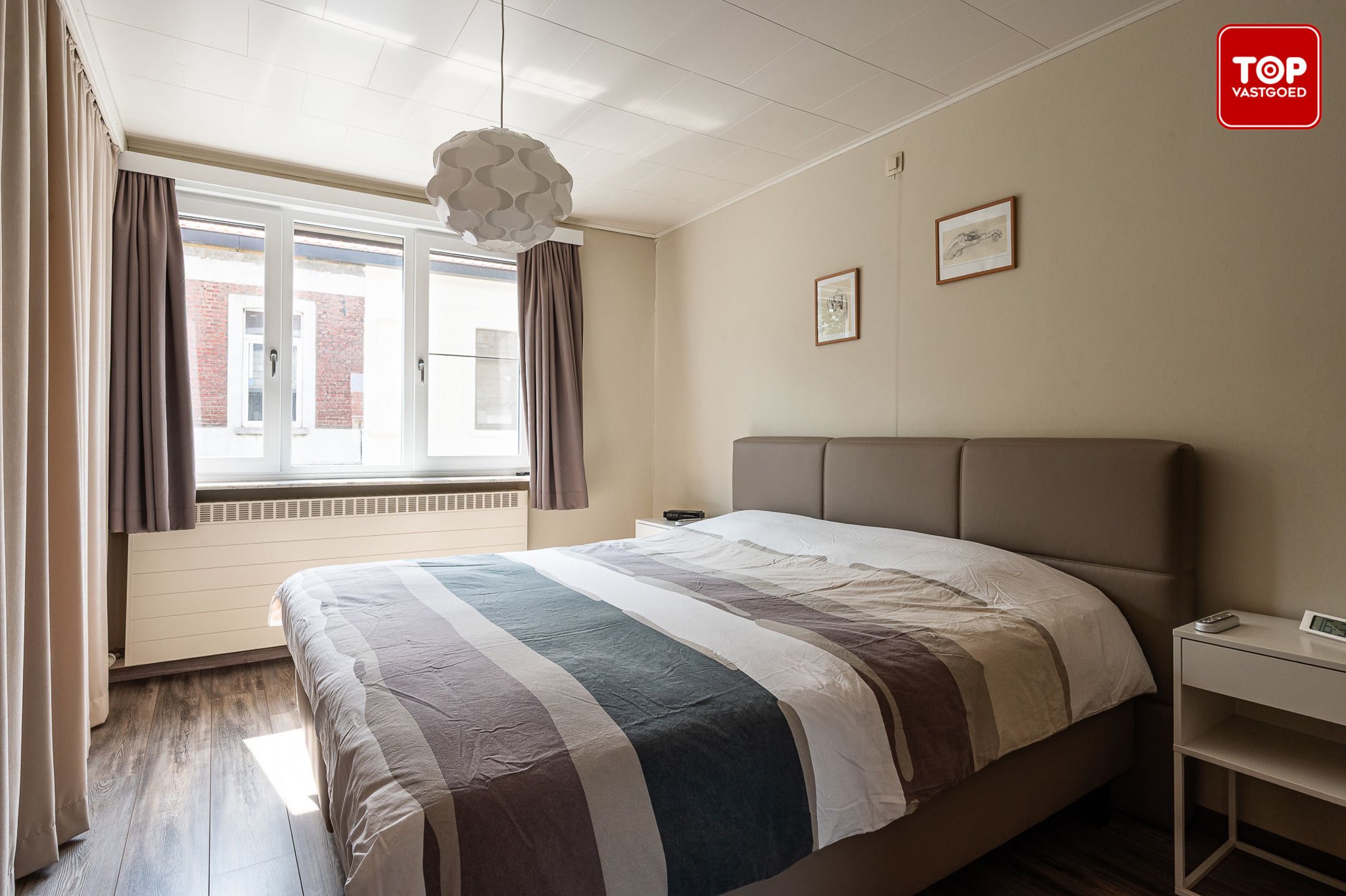 Instapklare woning met 2 slaapkamers en ruime koer in hartje Gentbrugge. foto 15