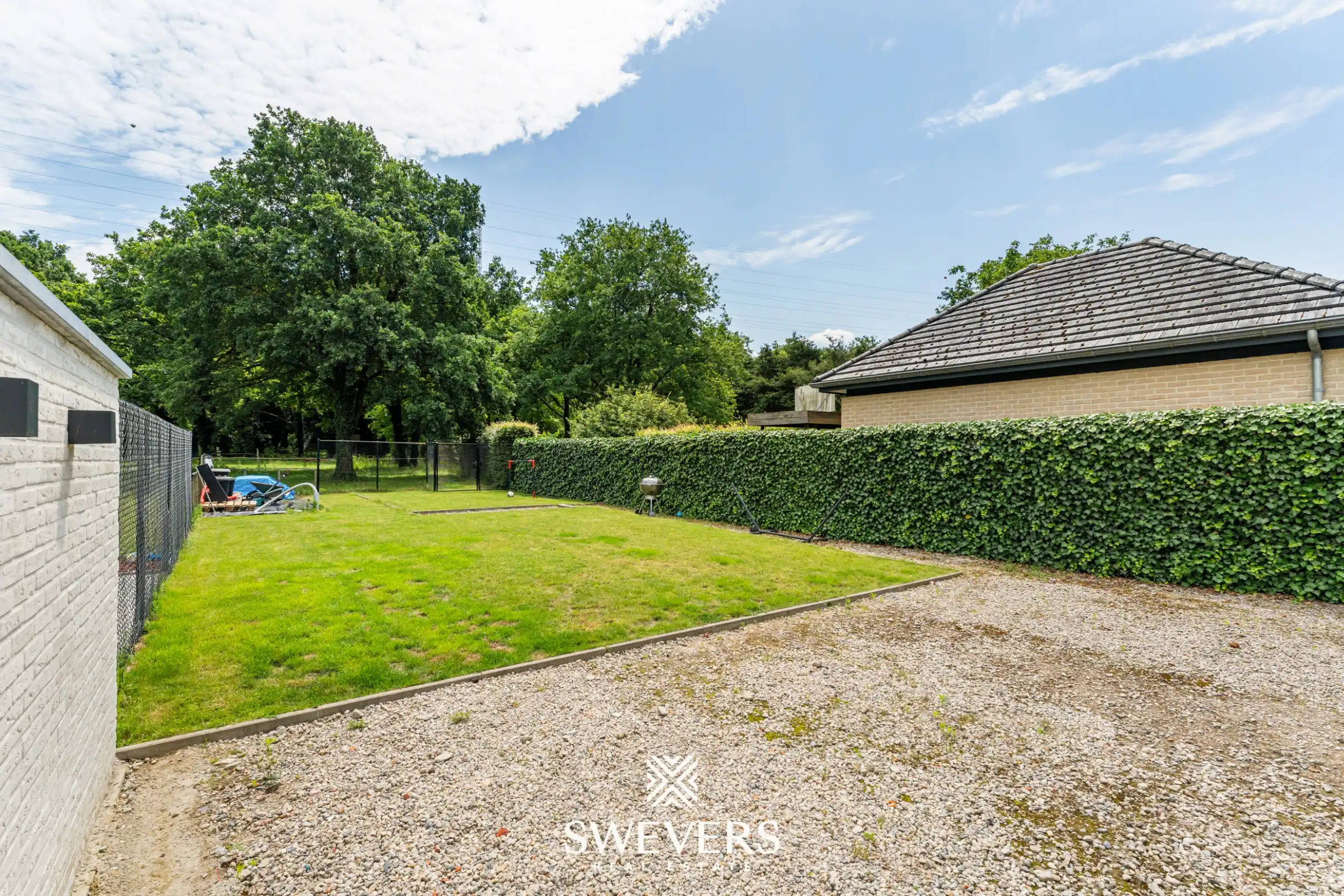 Recente halfopen bebouwing met 5 slaapkamers met verrassend grote tuin in Houthalen foto 21