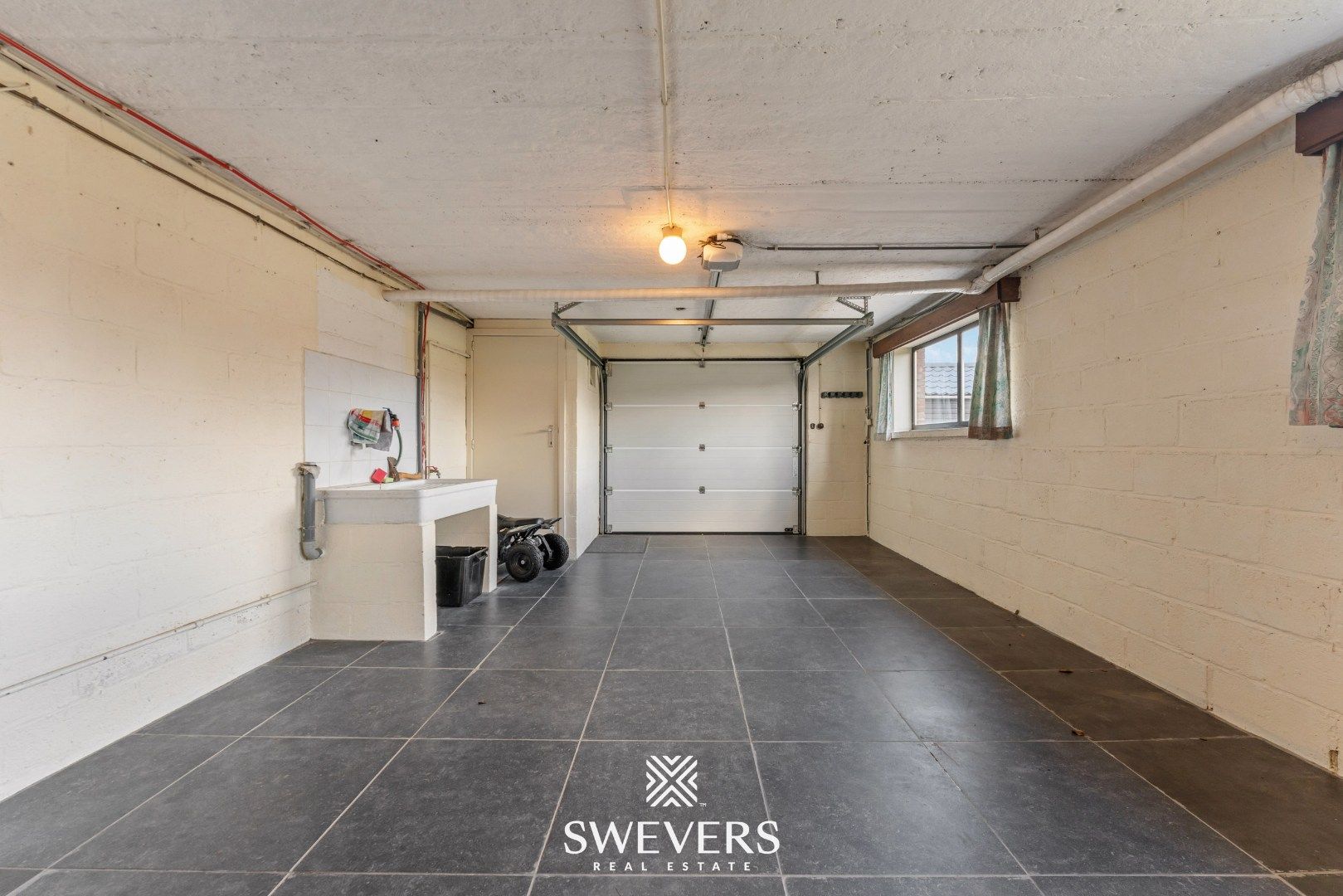Ruime gezinswoning met renovatiepotentieel in Borgloon foto 24