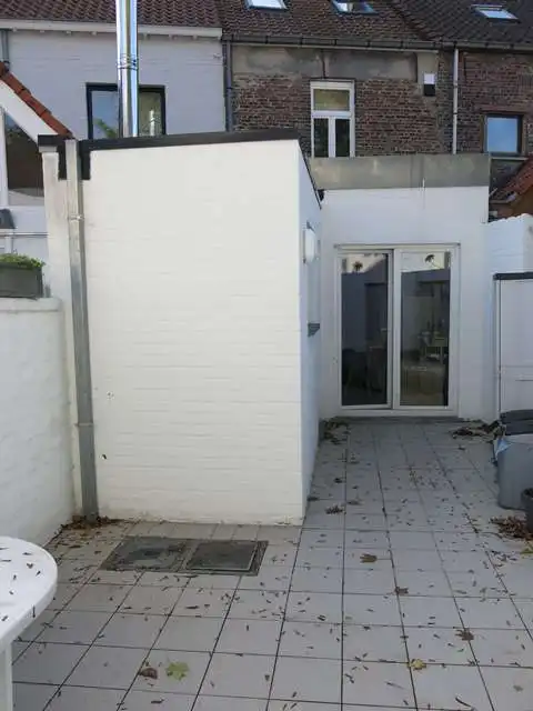 Gerenoveerd gelijkvloers appartement met ruim STADSTERRAS te huur in Brugge foto 9