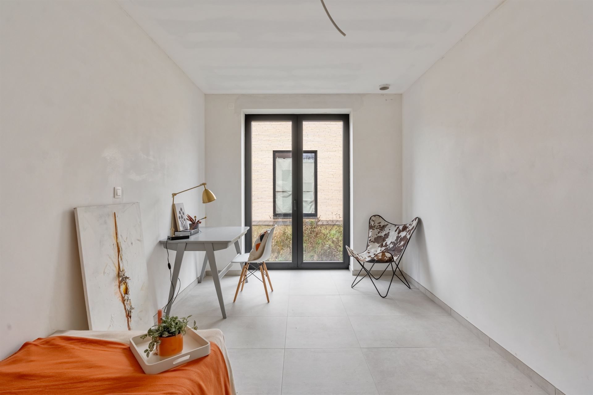 Gelijkvloerse woning met carport en tuin. foto 15