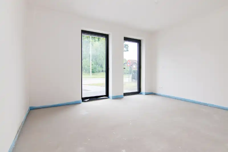 Ruim gelijkvloers nieuwbouwappartement met 4 slaapkamers en 2 badkamers, ruim terras en een mooie tuin op een goed bereikbare locatie! foto 9