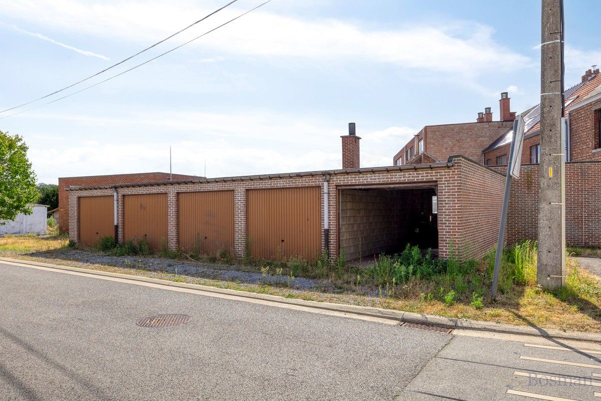 Halfopen bebouwing met 5 garageboxen te koop in Ham foto 20