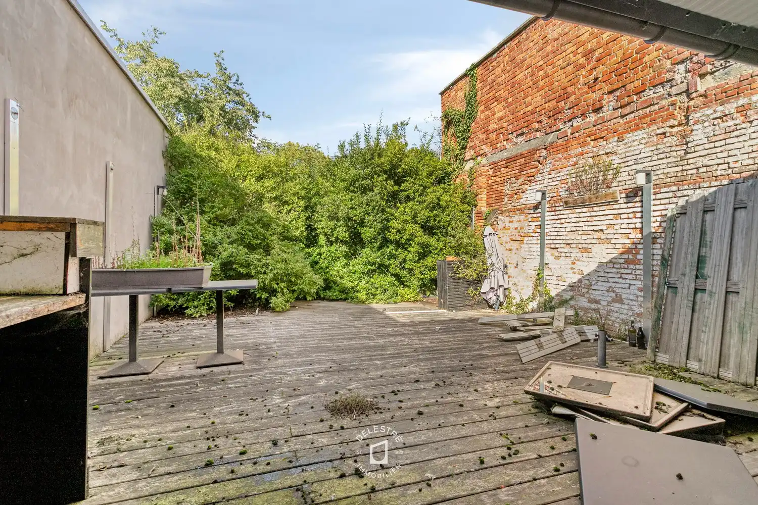 Veelzijdig renovatie- of herbestemmingsproject met zonnige stadstuin in vernieuwde Gentsestraat foto 3