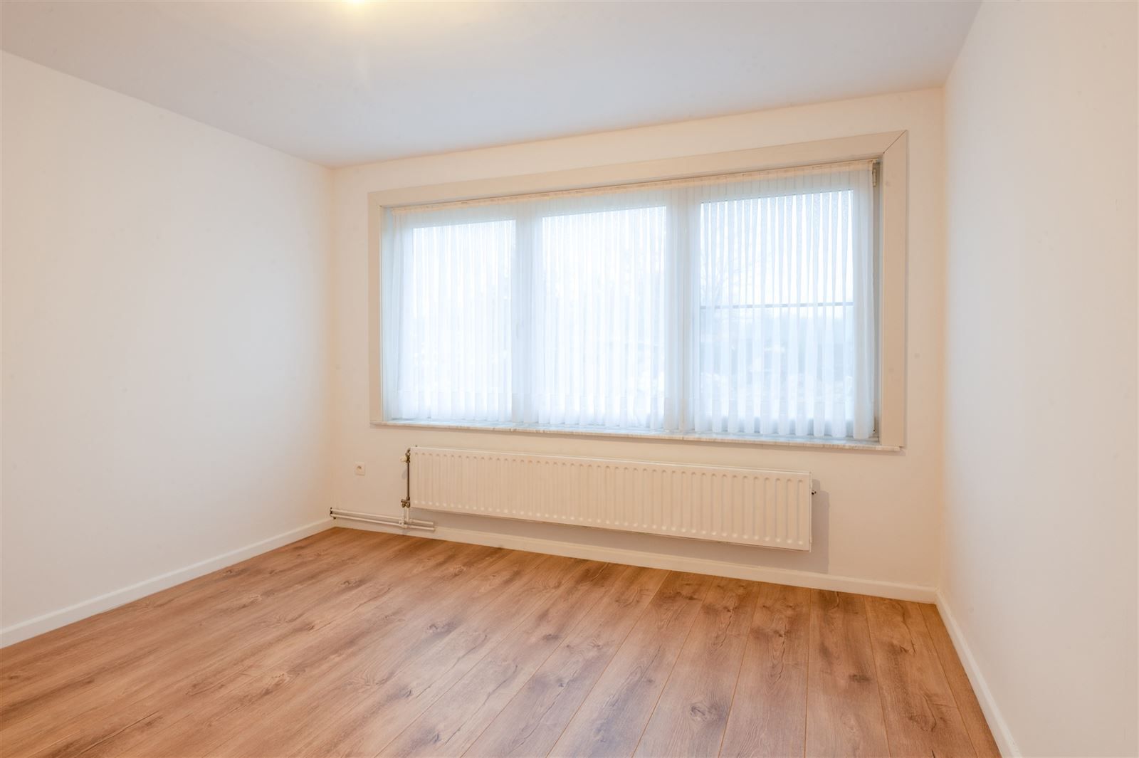 Gezellige gerenoveerde woning in een rustige wijk, met ruime tuin en garage foto 10