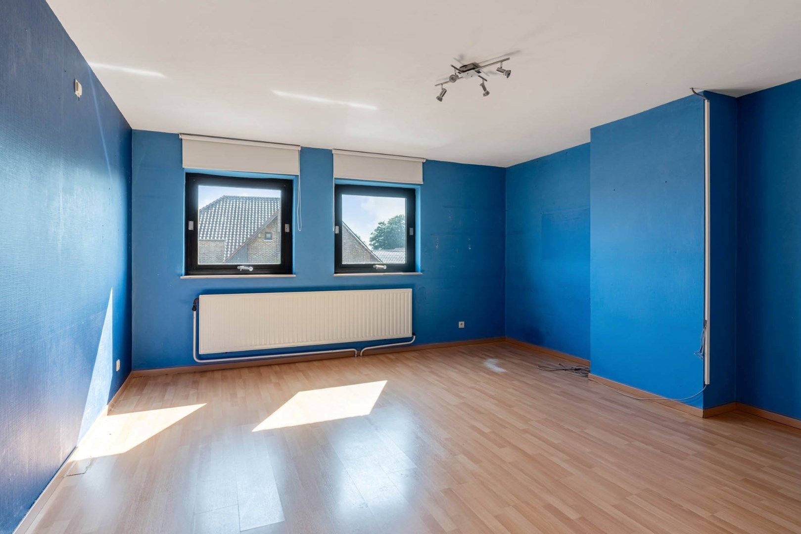 Multifunctioneel gebouw bestaande uit een woning, een winkel en een magazijn/werkplaats gelegen op een rustige locatie te Voorshoven! foto 16