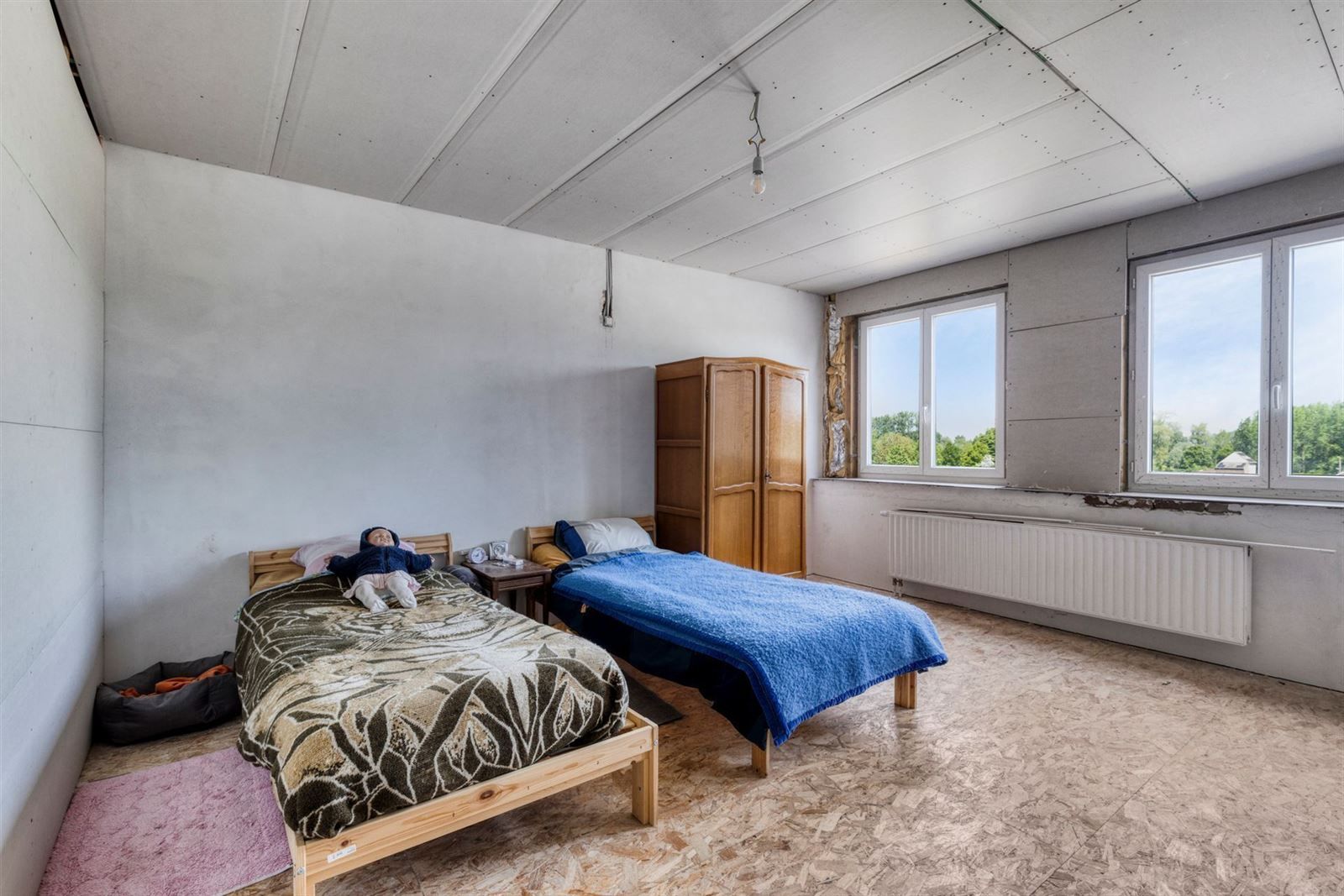 Verder te renoveren woning met grote tuin!  foto 9