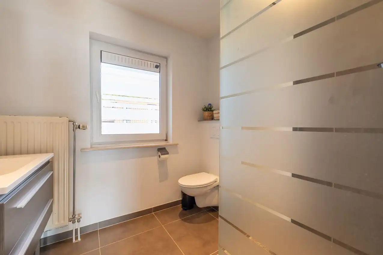 Appartement met twee slaapkamers, terras en autostaanplaats te midden van centrum foto 12