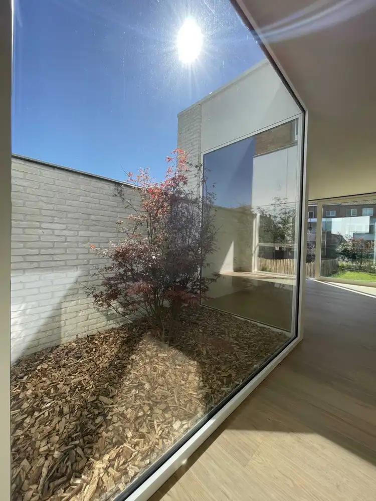 Smaakvol gerenoveerde woning met stadstuin foto 3