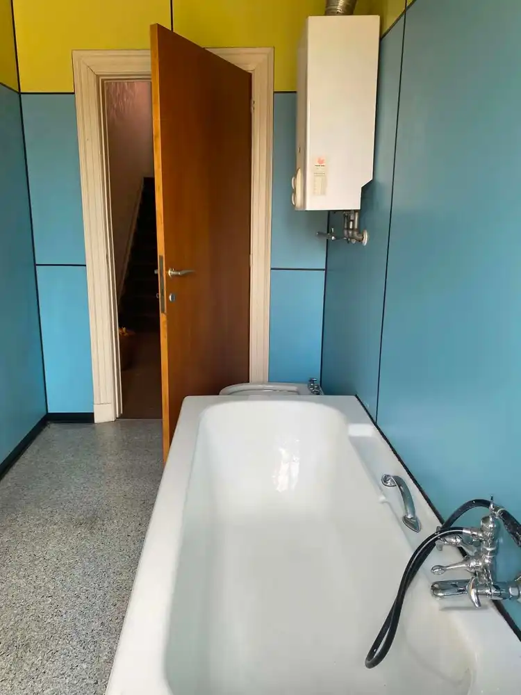 Centraal gelegen woning met tuin en ruime inrichtbare zolder foto 8