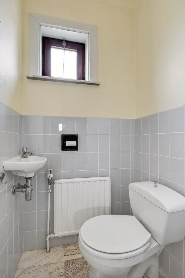 Ruime gelijkvloerse woning met veel potentieel op rustige ligging in Mol foto 10