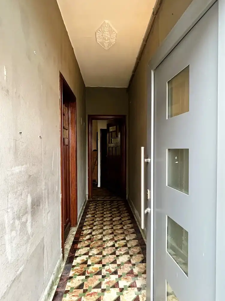 Te renoveren halfopen bebouwing met tuin - groot potentieel foto 3