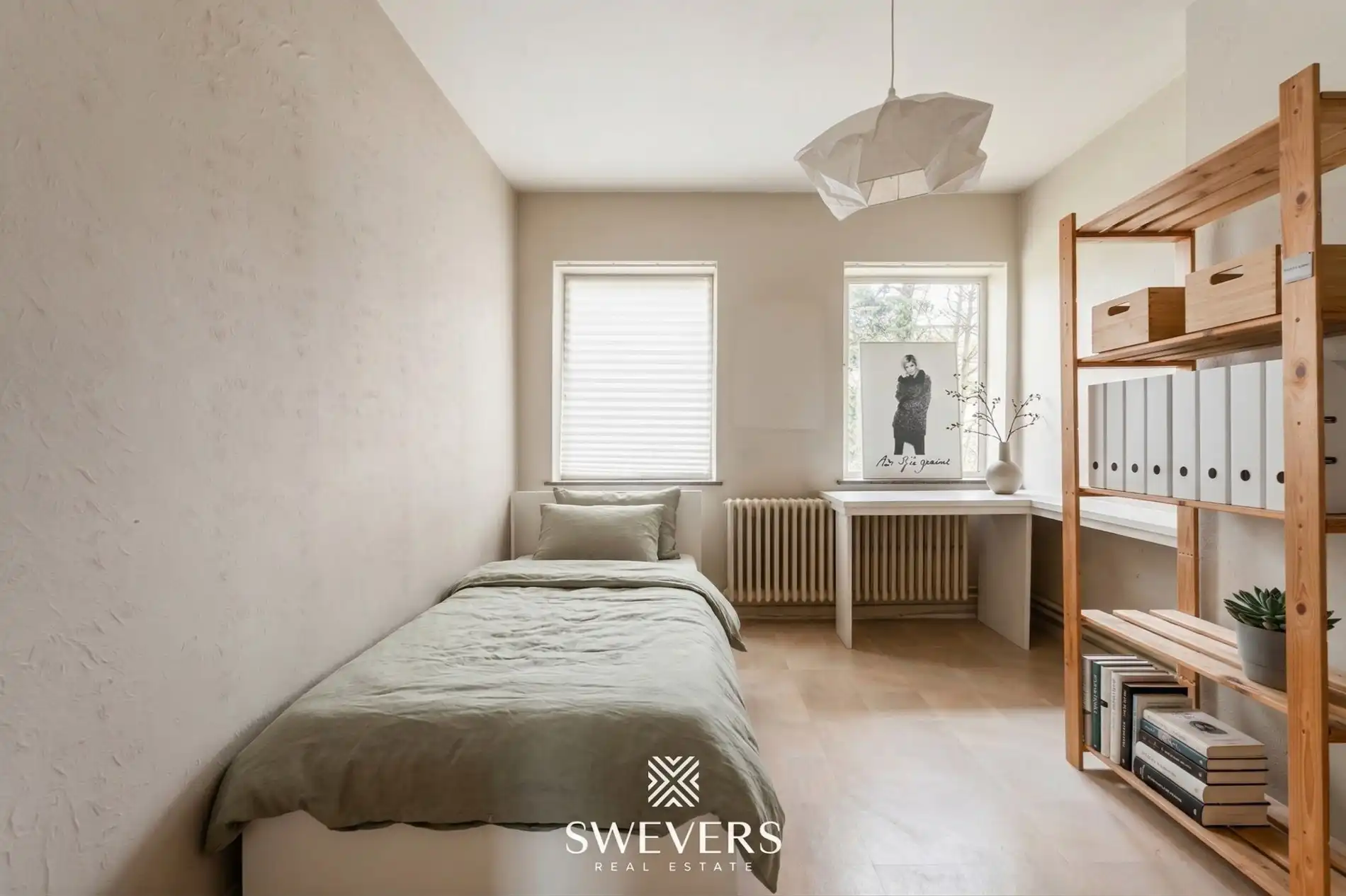 Ruime halfopen bebouwing met 4 slaapkamers en veel renovatiepotentieel op topligging in Hasselt foto 17