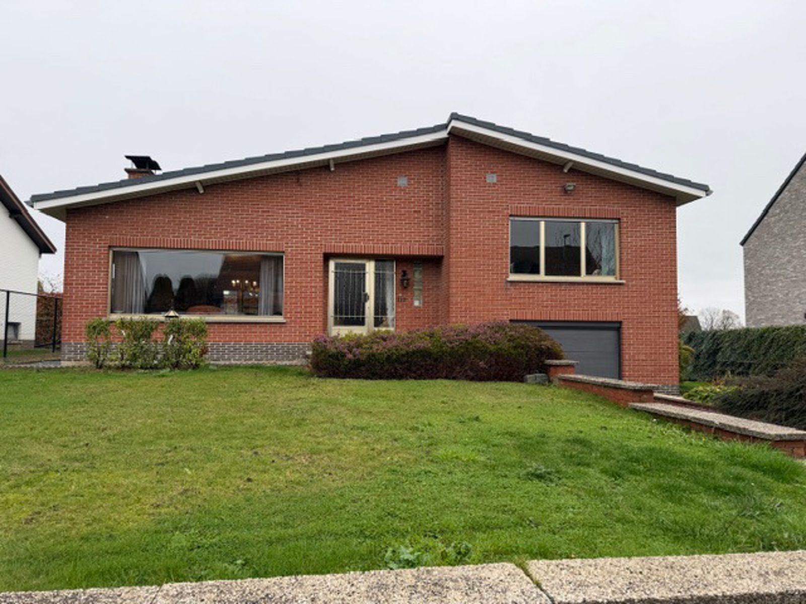 Charmante splitlevelwoning 2 slpks en grote garage te Tienen foto 2