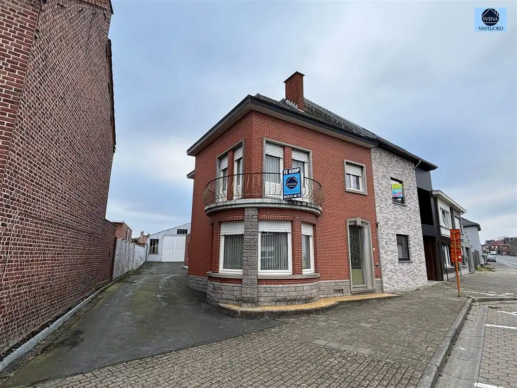 Hoofdfoto van de publicatie: SOLIDE CHARMANTE WONING MET 3 KAMERS EN LOODS