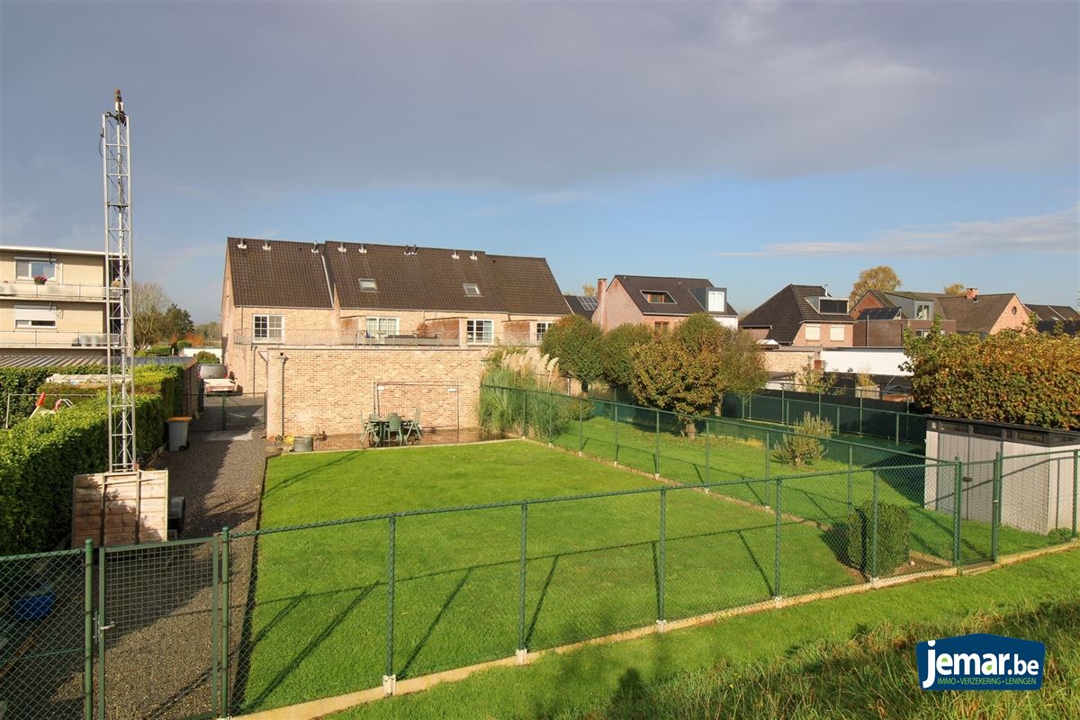 Instapklare gezinswoning met maar liefst 5 slaapkamers en 2 badkamers op ruim perceel van 7a80ca met dubbele garage in het rustige Uikhoven! foto 22