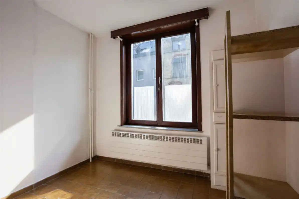 Rijwoning  met 4 slaapkamers en mooie tuin foto 8
