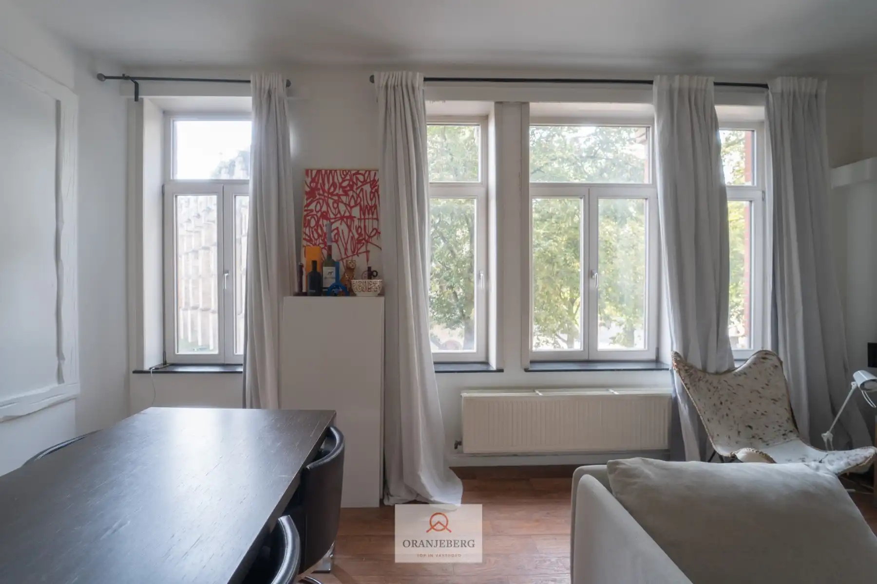Uniek gelegen appartement in hartje Gent op het Sint-Baafsplein foto 8