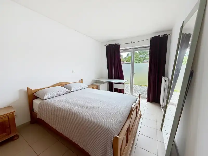 Gelijkvloers appartement met 2 slaapkamers en tuin foto 6