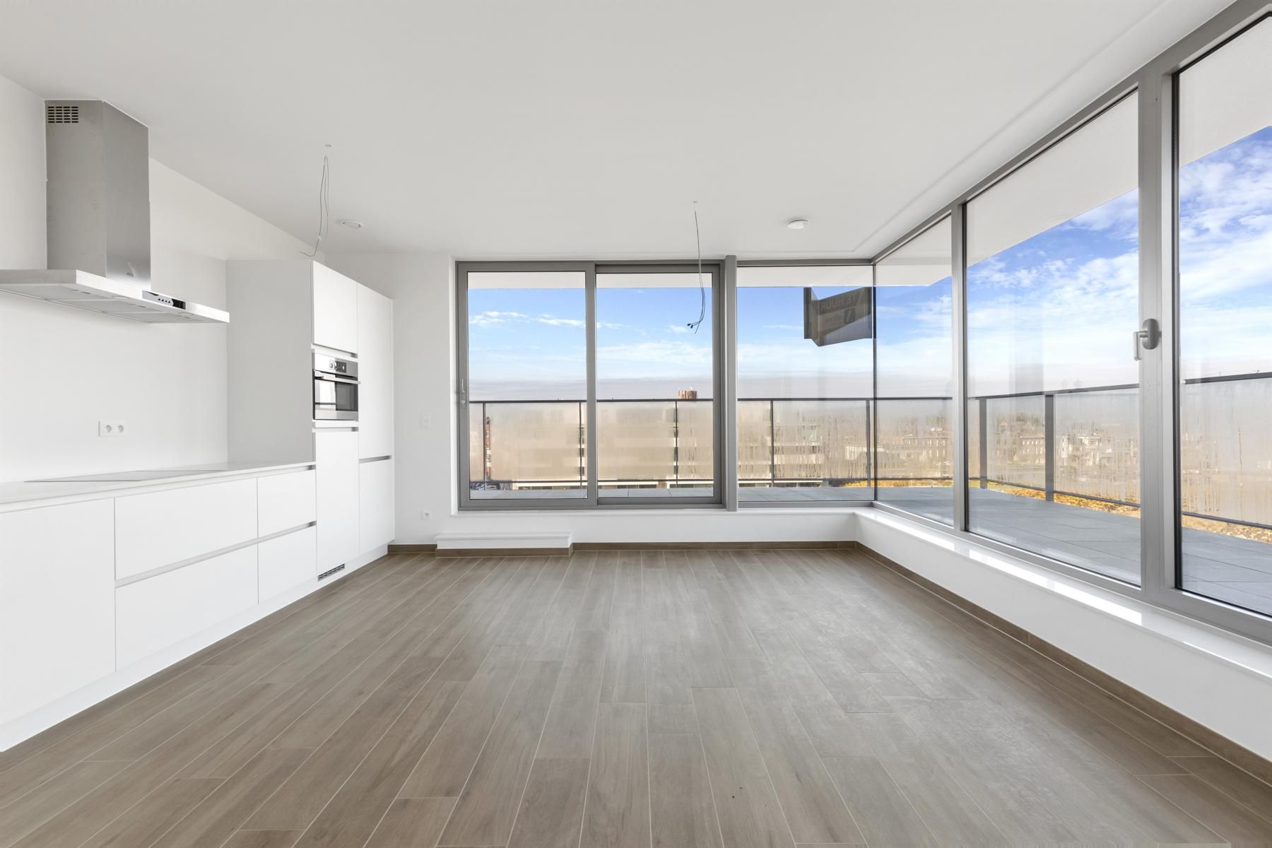 Penthouse met 1slpk en riant terras en ond. berging foto 2