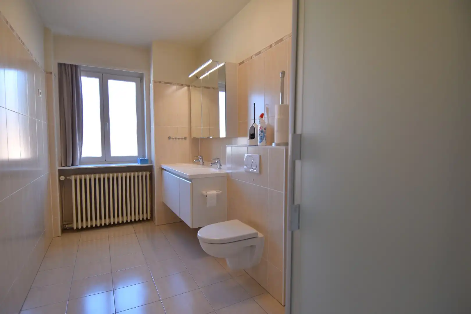 Ruim 3-slaapkamer appartement met garage in hartje Kortrijk foto 8