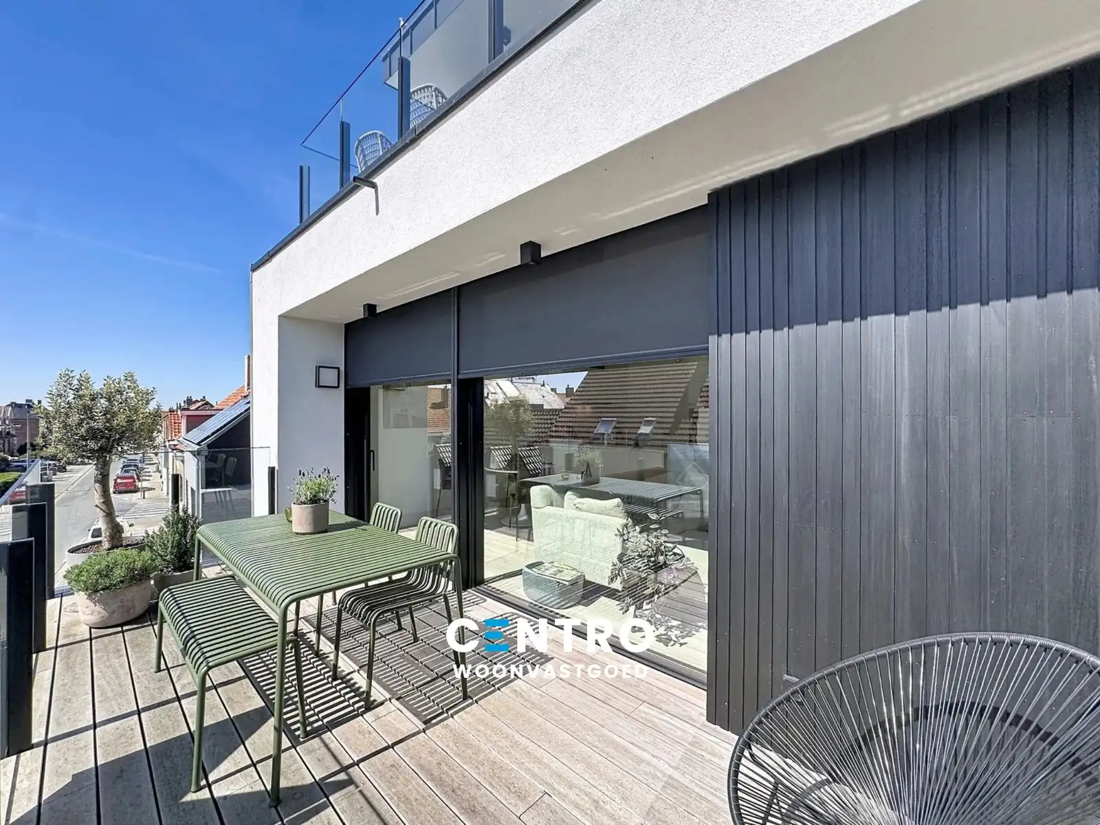 Instapklaar en stijlvol afgewerkt appartement met zonneterrassen! foto {{pictureIndex}}