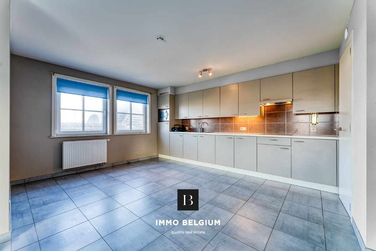 Ruim duplex appartement met 3 slaapkamers foto 2