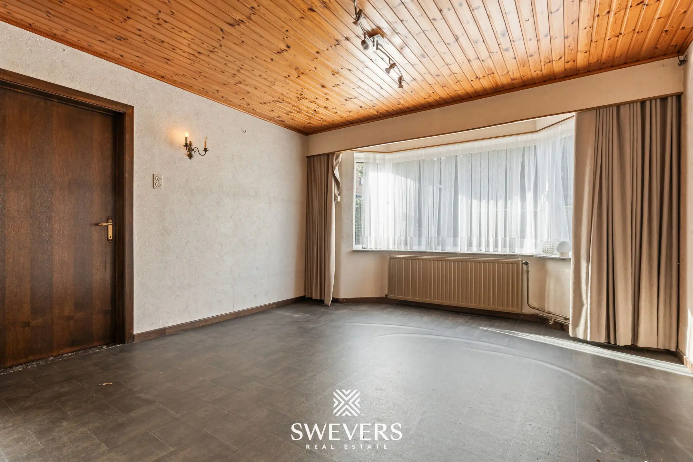 Ruime te renoveren woning op zonnig (ZW) perceel van 12a 33ca in het centrale Lummen foto 5