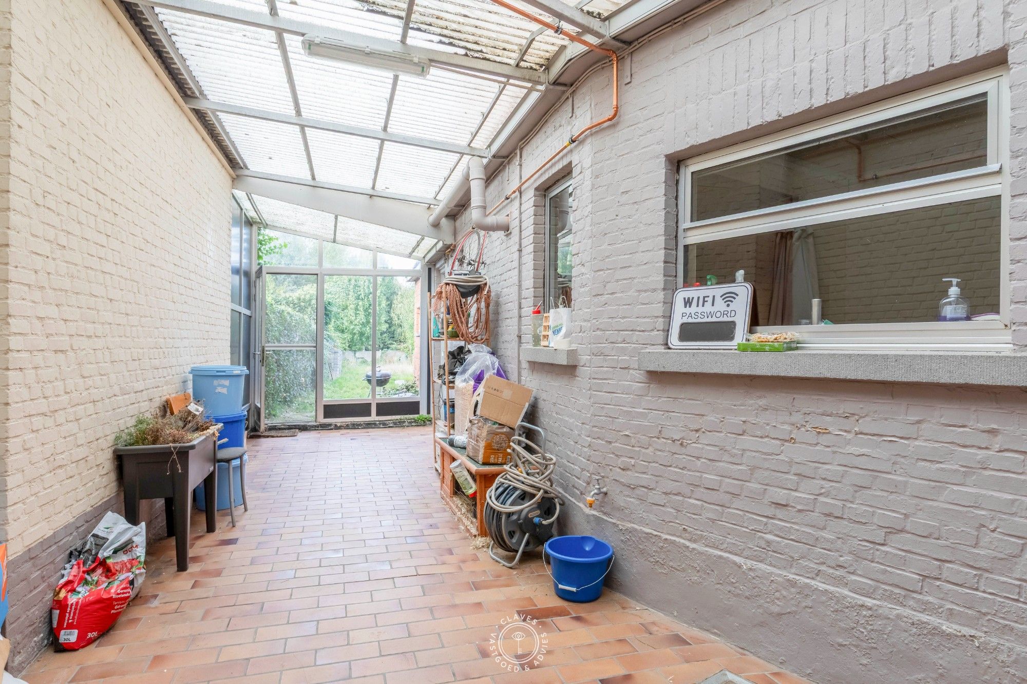 Ruime gezinswoning met fijne tuin en mogelijkheid tot vijf slaapkamers foto 7