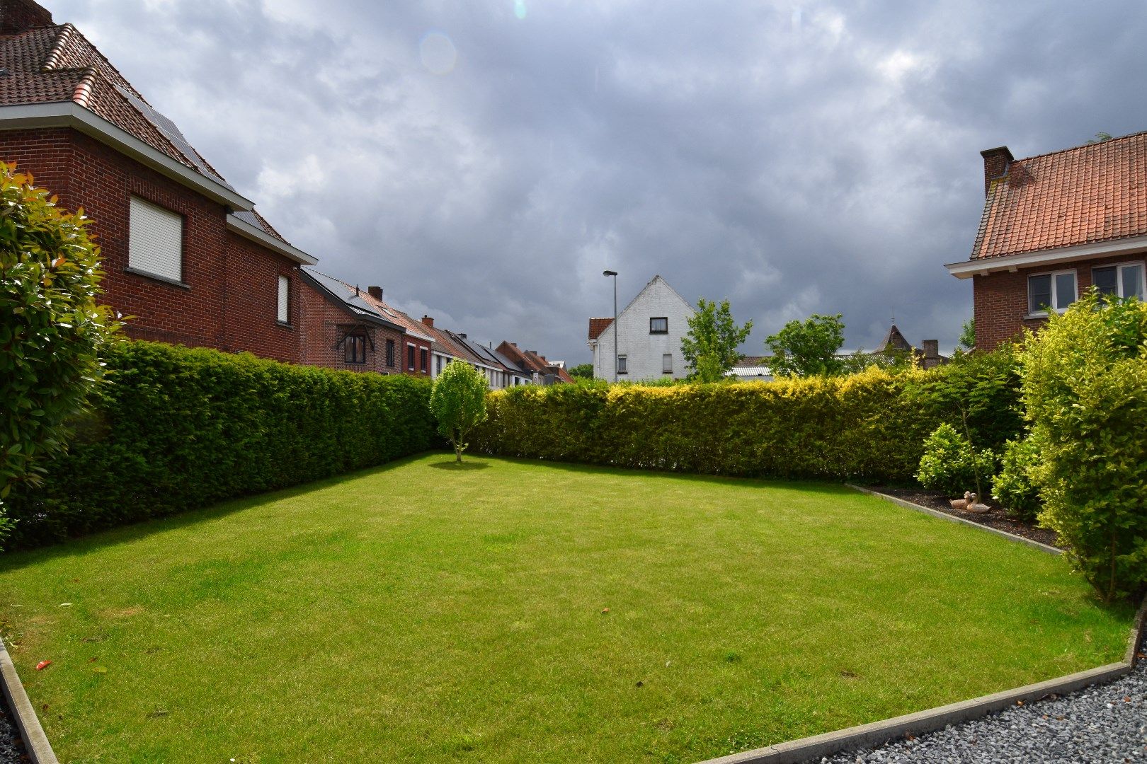 Instapklare halfopen gezinswoning met 3 slaapkamers, garage en zonnige tuin te koop in Kuurne foto 17