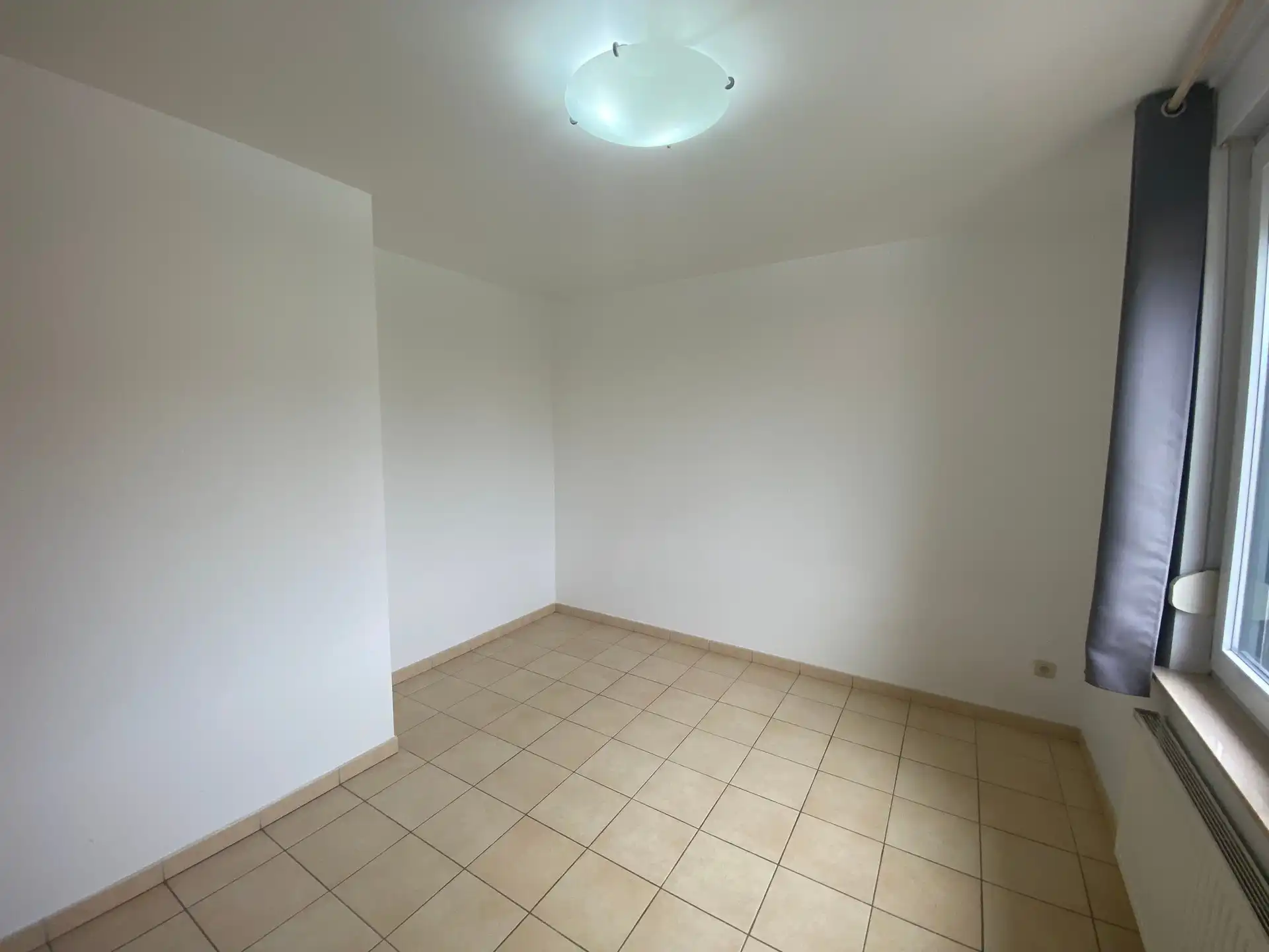 Ruime en lichtrijke woning met aangename west-geörienteerde tuin, gelegen in een rustige en doodlopende straat op wandelafstand van het centrum van Kortenberg. foto 14