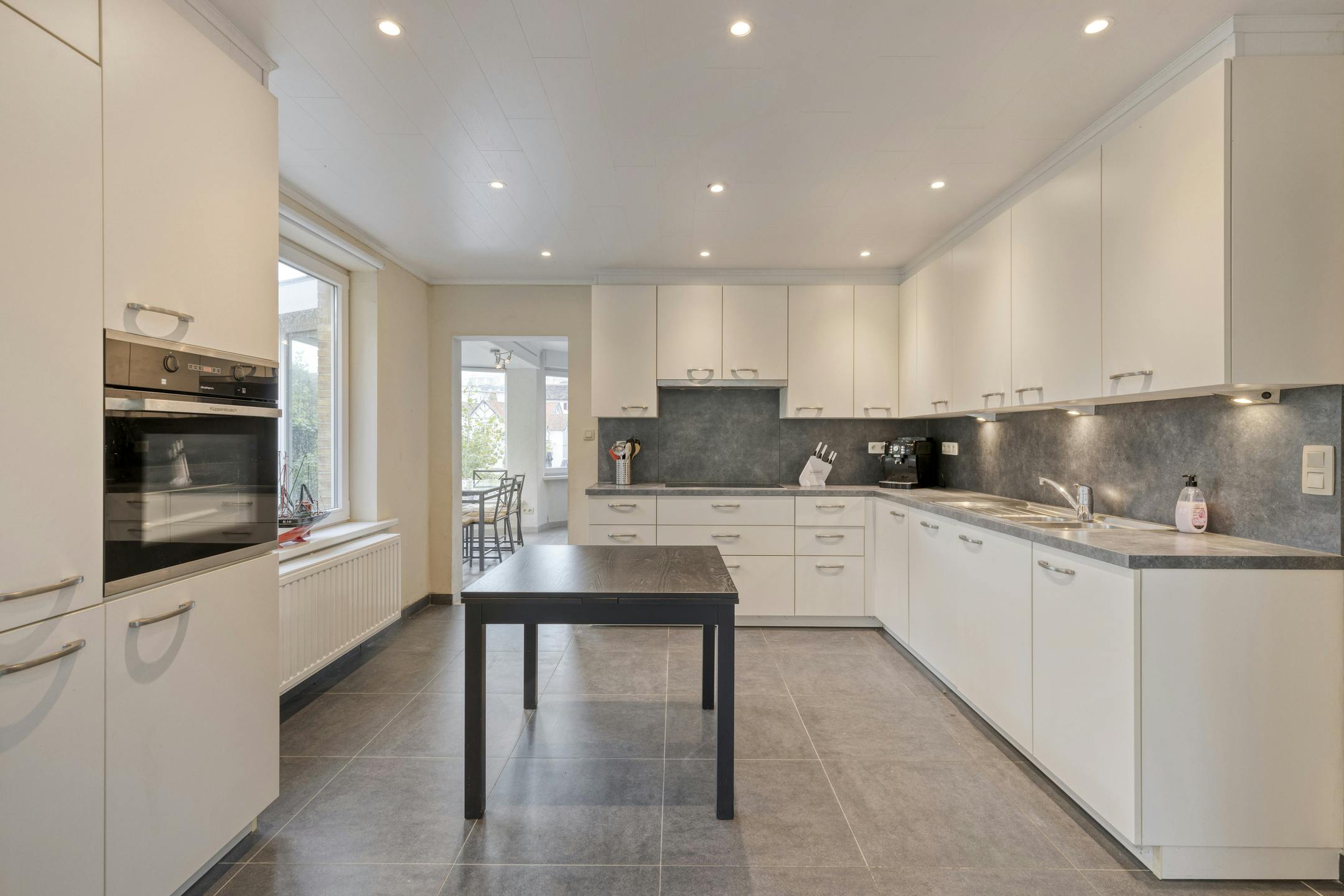 Gerenoveerd appartement (93m²) met zeer ruime tuin te De Panne foto 4