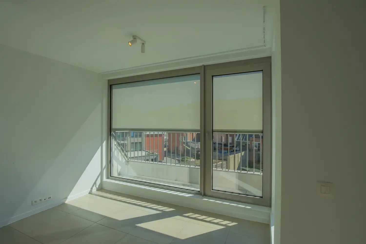 Energiezuinig dakappartement met 1 slaapkamer, aparte dressing/bureau, terras en ondergrondse staanplaats in Residentie Luster foto 6