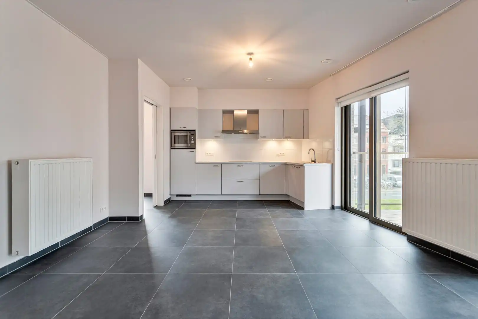 Recente assistentieflat met 2 slaapkamers en mooi zonneterras foto 9