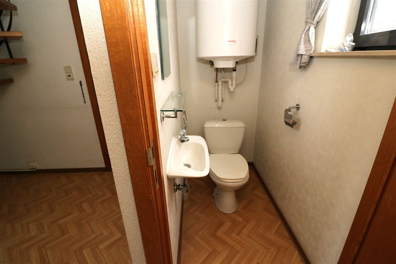 Centraal gelegen appartement met 3 slpk., garage en terras foto 15