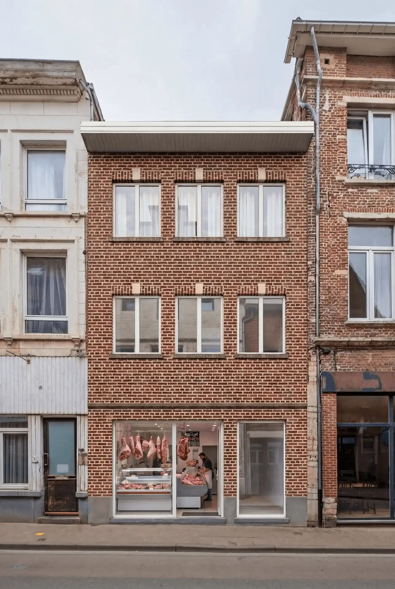 Gebouw met 3 appartementen + handel foto 2